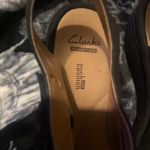 Size 8, women’s Clarks heel no stains rips or tears never worn